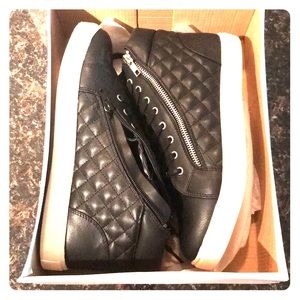 Never been worn black leather high top sneakers